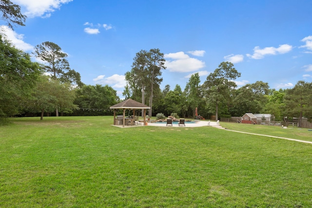 8483 Majestic Lake Ct, Montgomery, TX 77316 - view of yard with a gazebo, a patio area, and an outdoor pool