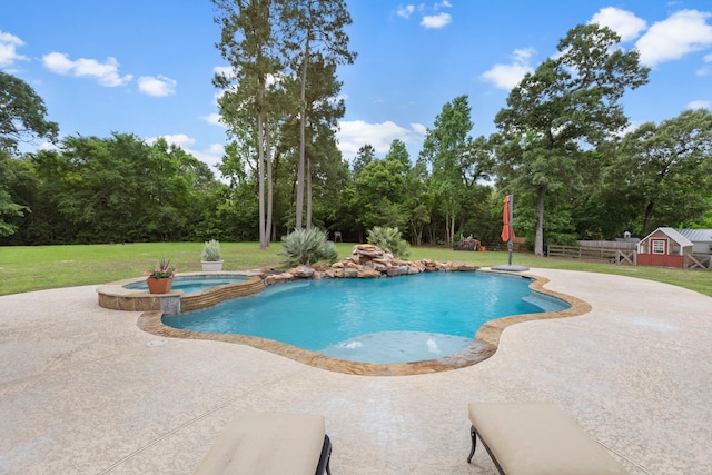 8483 Majestic Lake Ct, Montgomery, TX 77316 - view of pool featuring a lawn, a patio area, and a pool with connected hot tub