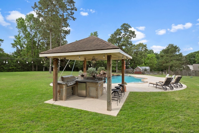 8483 Majestic Lake Ct, Montgomery, TX 77316 - view of swimming pool featuring a grill, a lawn, area for grilling, a gazebo, and fence private yard