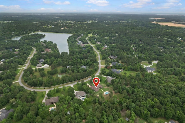 8483 Majestic Lake Ct, Montgomery, TX 77316 - aerial view with a water view and a view of trees