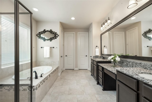 18538 Wade Creek Ln, Cypress, TX 77433 - full bath with vanity, recessed lighting, and a bath