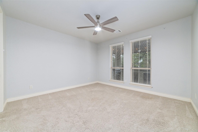 18538 Wade Creek Ln, Cypress, TX 77433 - carpeted empty room with visible vents, baseboards, and ceiling fan