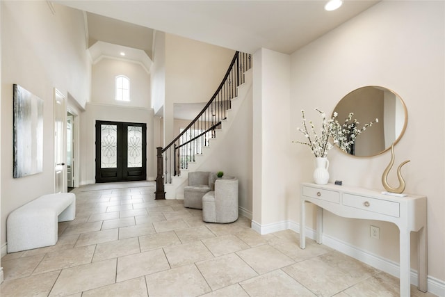 18538 Wade Creek Ln, Cypress, TX 77433 - entryway featuring stairway, a towering ceiling, baseboards, and recessed lighting
