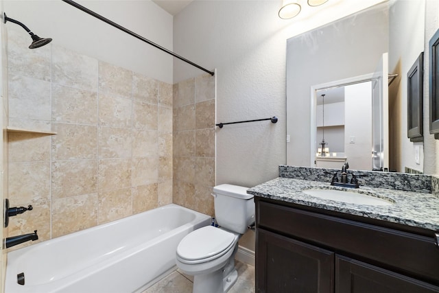 18538 Wade Creek Ln, Cypress, TX 77433 - bathroom featuring toilet, vanity, shower / tub combination, and a textured wall