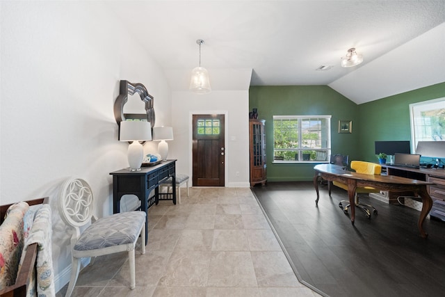 18740 Laurel Hills Dr, New Caney, TX 77357 - entryway with vaulted ceiling, baseboards, and visible vents