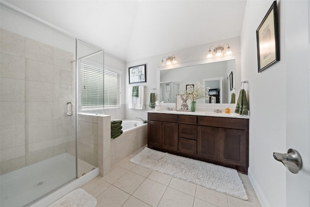 18740 Laurel Hills Dr, New Caney, TX 77357 - full bathroom featuring a sink, a garden tub, a shower stall, and tile patterned floors
