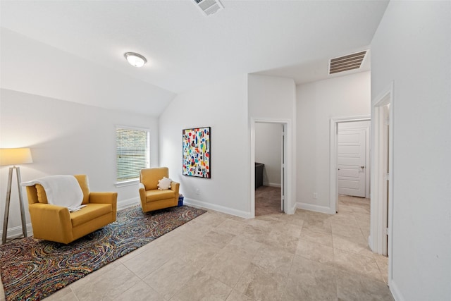 18740 Laurel Hills Dr, New Caney, TX 77357 - living area with light tile patterned floors, visible vents, baseboards, and lofted ceiling