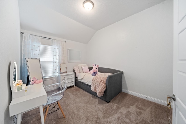 18740 Laurel Hills Dr, New Caney, TX 77357 - carpeted bedroom with lofted ceiling and baseboards