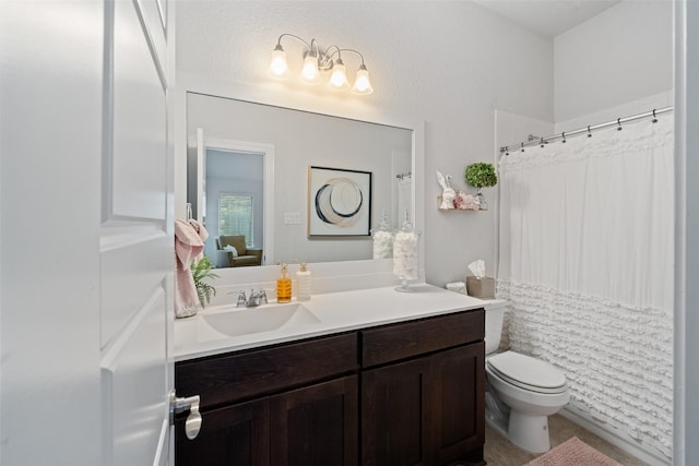 18740 Laurel Hills Dr, New Caney, TX 77357 - ensuite bathroom featuring vanity, connected bathroom, toilet, and a shower with shower curtain