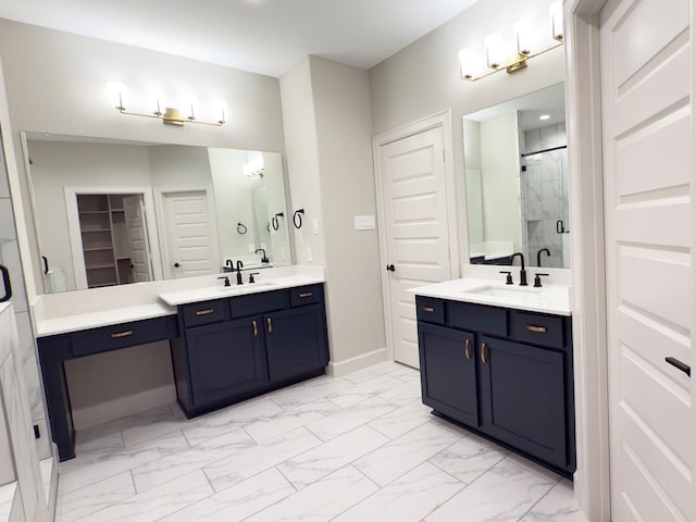 313 E 27th St, Houston, TX 77008 - bathroom with a stall shower, marble finish floor, two vanities, and a sink