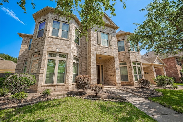 7611 Herndon Pl, Sugar Land, TX 77479 - traditional-style home featuring a front yard
