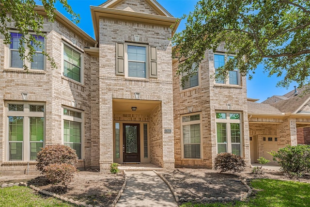 7611 Herndon Pl, Sugar Land, TX 77479 - view of front of home with brick siding