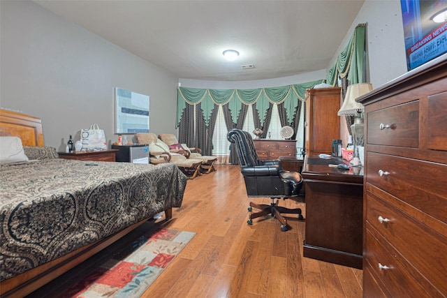7611 Herndon Pl, Sugar Land, TX 77479 - bedroom featuring light wood-style floors and a desk