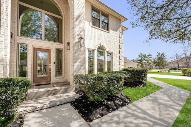 686 Edgewood Dr, Montgomery, TX 77356 - entrance to property featuring stone siding and brick siding