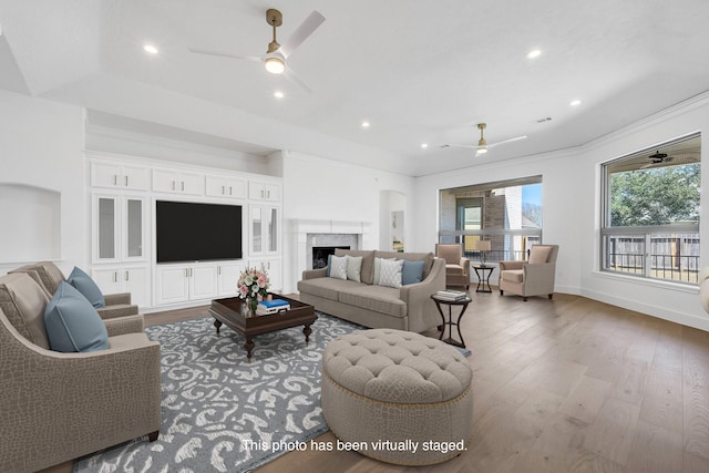 686 Edgewood Dr, Montgomery, TX 77356 - living room with wood finished floors, baseboards, ceiling fan, and recessed lighting