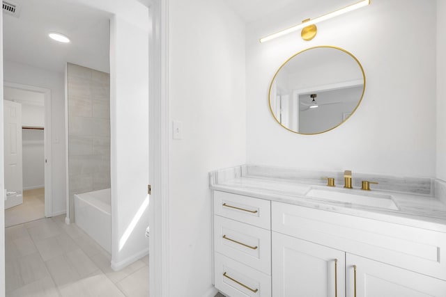 686 Edgewood Dr, Montgomery, TX 77356 - bathroom with baseboards, tile patterned floors, vanity, and visible vents