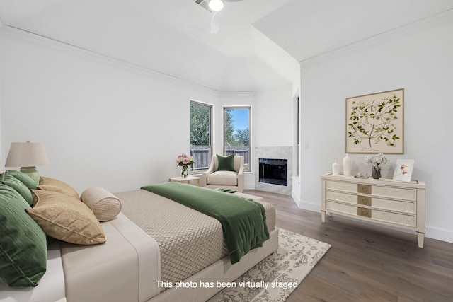 686 Edgewood Dr, Montgomery, TX 77356 - bedroom featuring wood finished floors, high vaulted ceiling, a premium fireplace, baseboards, and access to exterior