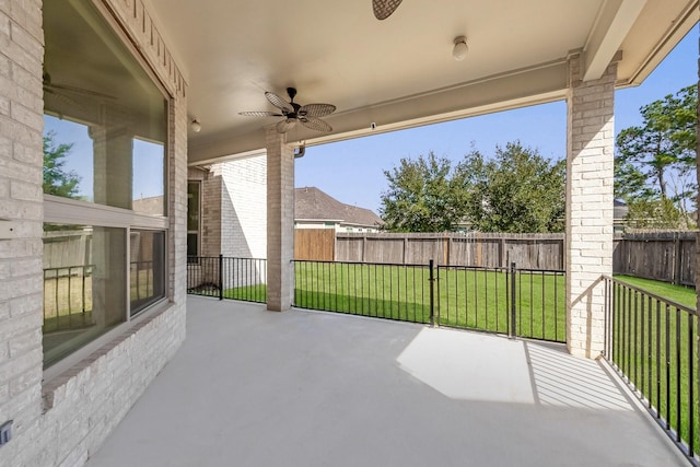 686 Edgewood Dr, Montgomery, TX 77356 - view of patio with a ceiling fan and a fenced backyard