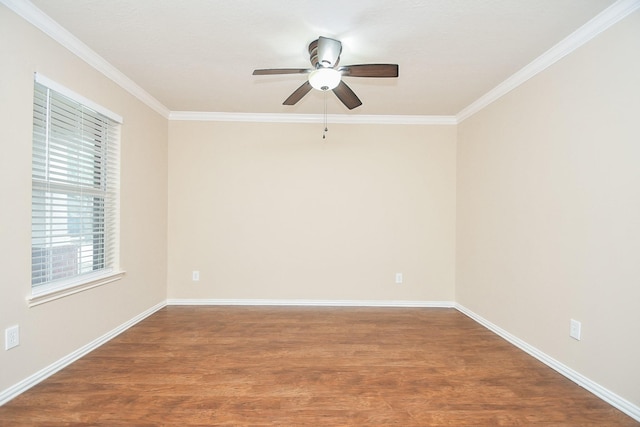 19826 Seagler Glen Ln, Katy, TX 77449 - empty room with crown molding, wood finished floors, ceiling fan, and baseboards
