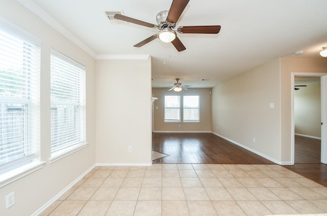 19826 Seagler Glen Ln, Katy, TX 77449 - unfurnished room featuring ceiling fan, baseboards, crown molding, a smoke detector, and wood finished floors