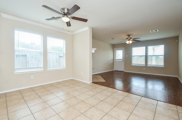 19826 Seagler Glen Ln, Katy, TX 77449 - spare room featuring a ceiling fan, crown molding, baseboards, and wood finished floors