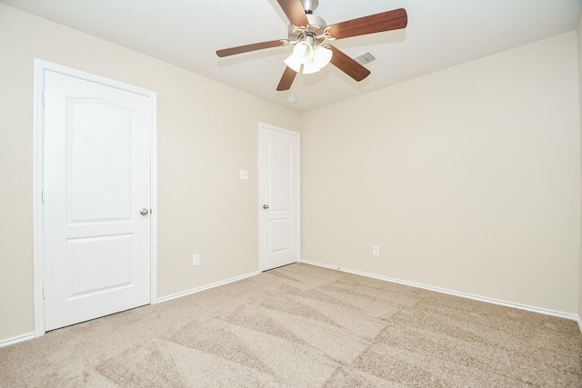 19826 Seagler Glen Ln, Katy, TX 77449 - unfurnished bedroom with light colored carpet, baseboards, and ceiling fan