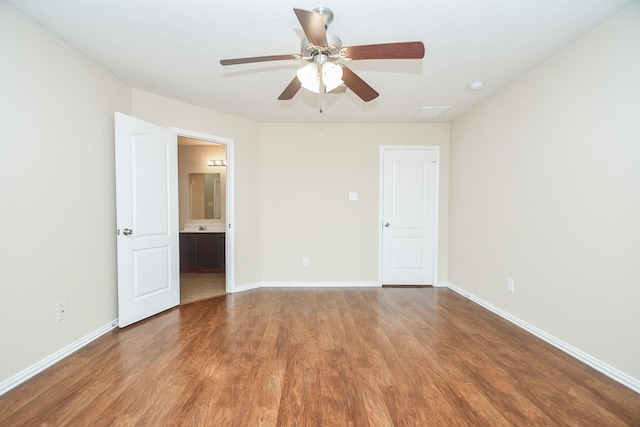 19826 Seagler Glen Ln, Katy, TX 77449 - spare room featuring wood finished floors, a ceiling fan, and baseboards