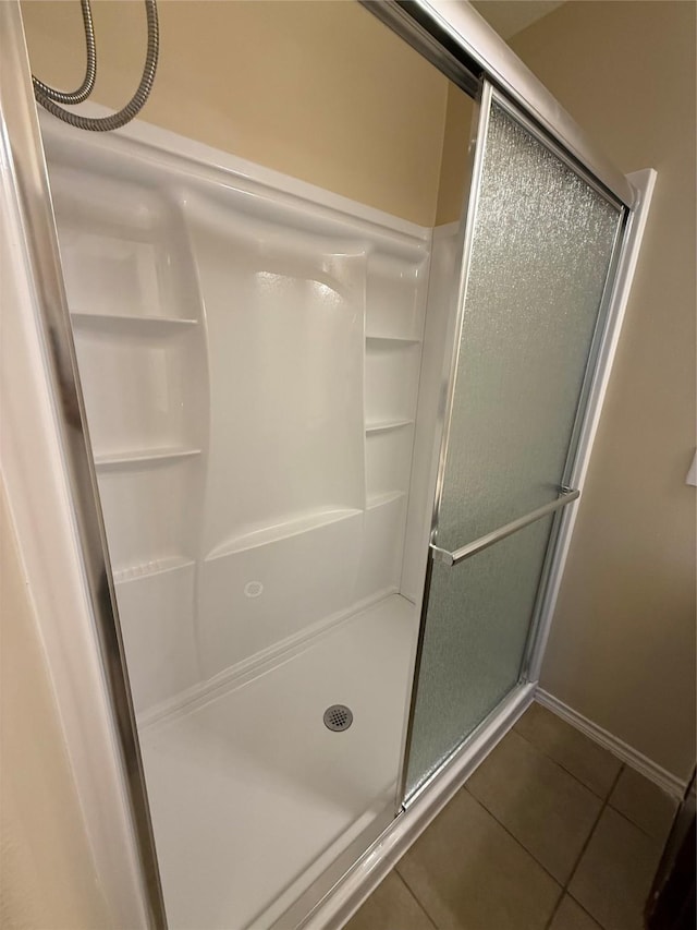 19826 Seagler Glen Ln, Katy, TX 77449 - full bath featuring tile patterned floors and a shower stall