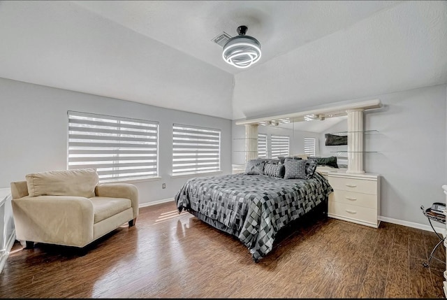 16107 Lakestone Dr, Tomball, TX 77377 - bedroom featuring lofted ceiling, wood finished floors, baseboards, and ceiling fan