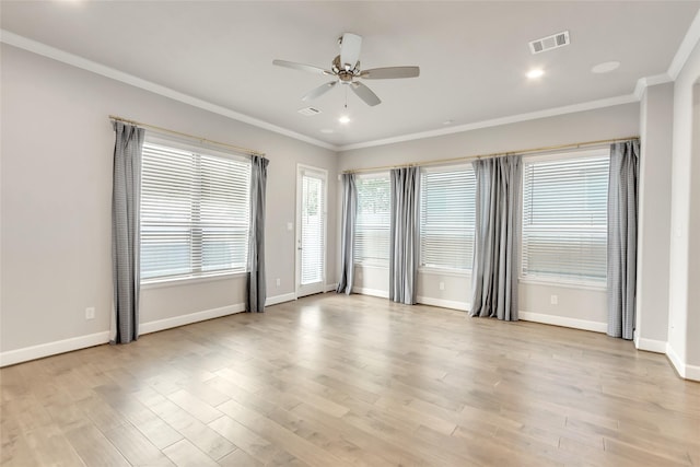 5432 Nolda St, Houston, TX 77007 - spare room with light wood finished floors, visible vents, baseboards, ceiling fan, and ornamental molding