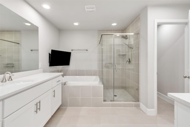 5432 Nolda St, Houston, TX 77007 - full bathroom featuring tile patterned flooring, a garden tub, a shower stall, and vanity