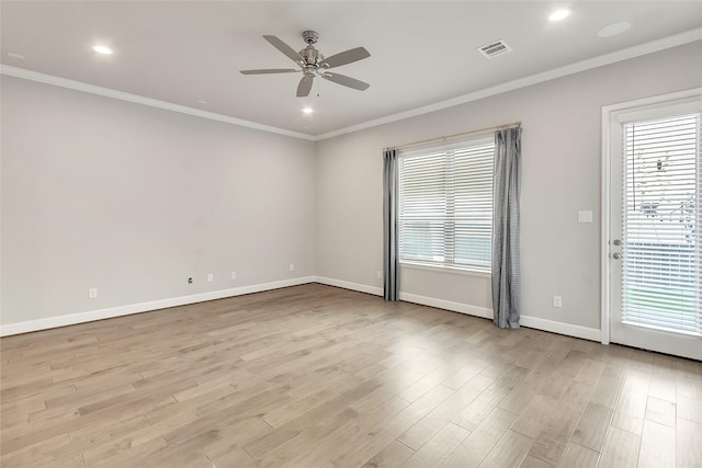 5432 Nolda St, Houston, TX 77007 - unfurnished room featuring ornamental molding, a wealth of natural light, a ceiling fan, and wood finished floors