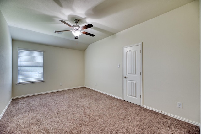 22418 Mary Rogers Trl, Richmond, TX 77469 - carpeted empty room featuring a ceiling fan, baseboards, and vaulted ceiling