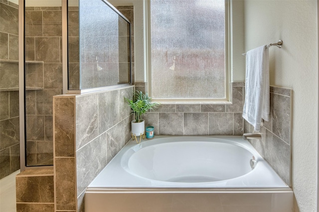 22418 Mary Rogers Trl, Richmond, TX 77469 - full bath featuring a bath and tiled shower