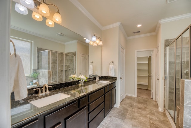 22418 Mary Rogers Trl, Richmond, TX 77469 - bathroom featuring a stall shower, double vanity, a spacious closet, and ornamental molding