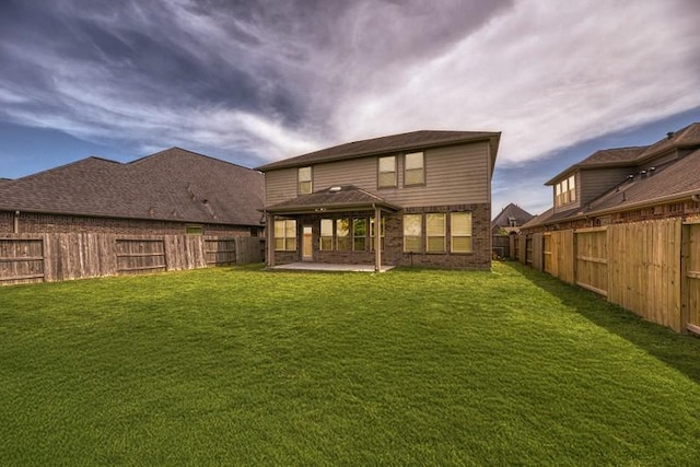 22418 Mary Rogers Trl, Richmond, TX 77469 - rear view of property featuring a patio and brick siding