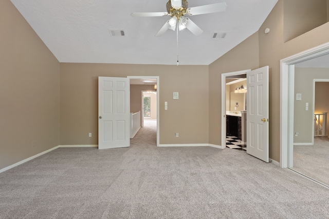 12207 Glenview Dr, Montgomery, TX 77356 - unfurnished bedroom with light carpet, lofted ceiling, baseboards, and ceiling fan