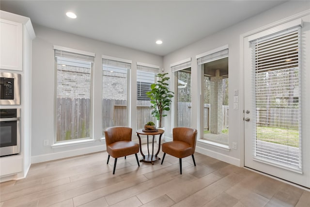 318 Mistletoe Ridge Ct, Montgomery, TX 77316 - sitting room with light wood-type flooring, baseboards, and recessed lighting