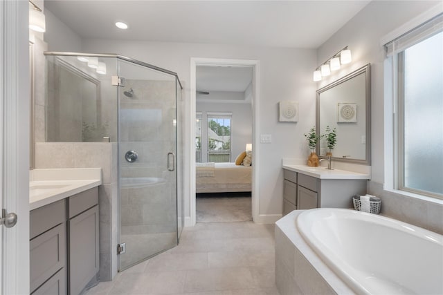 318 Mistletoe Ridge Ct, Montgomery, TX 77316 - ensuite bathroom with a garden tub, a shower stall, and two vanities