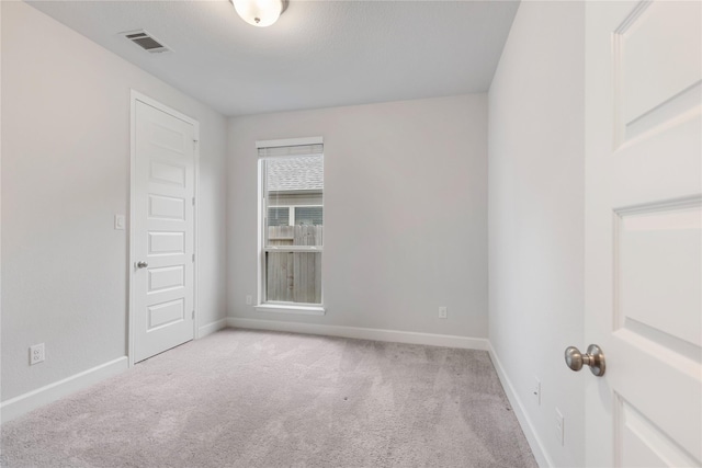318 Mistletoe Ridge Ct, Montgomery, TX 77316 - carpeted empty room featuring baseboards and visible vents