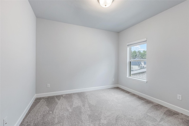 318 Mistletoe Ridge Ct, Montgomery, TX 77316 - carpeted empty room featuring baseboards