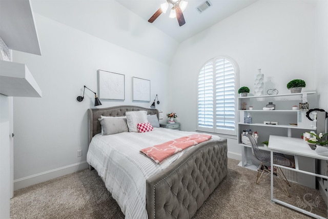 bedroom with vaulted ceiling, carpet floors, baseboards, and a ceiling fan