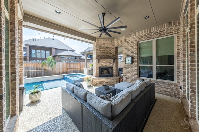 view of patio with an outdoor living space with a fireplace, a fenced backyard, and ceiling fan