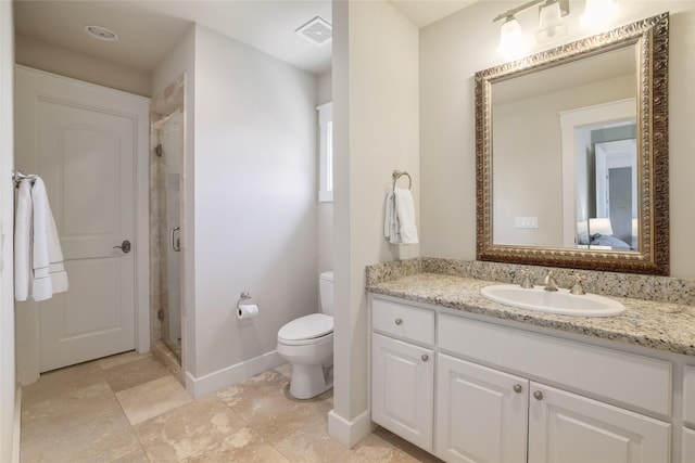 508 Golden Bear Dr, Austin, TX 78738 - ensuite bathroom featuring toilet, vanity, visible vents, a shower stall, and baseboards