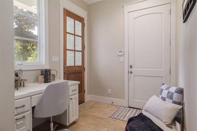 508 Golden Bear Dr, Austin, TX 78738 - office with baseboards, light tile patterned flooring, and built in study area