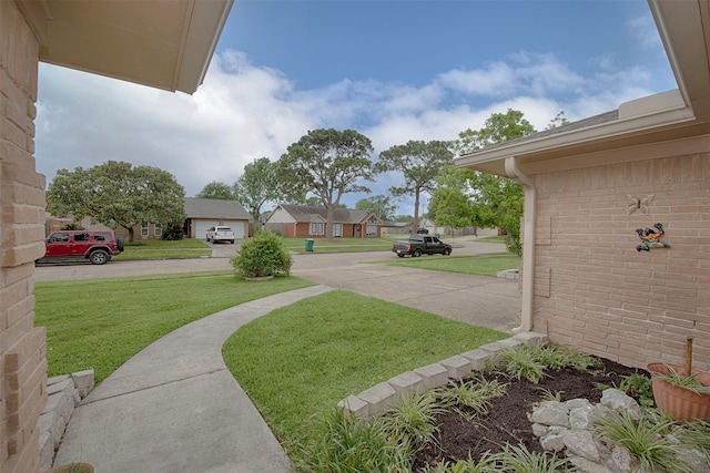 view of yard featuring a residential view