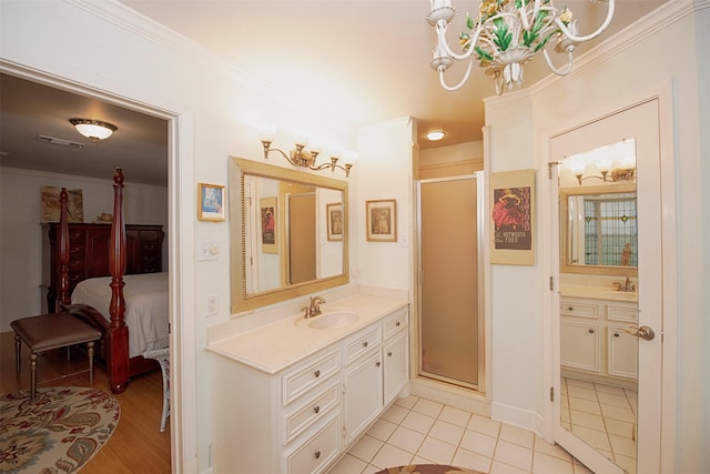 full bathroom with a notable chandelier, crown molding, ensuite bathroom, visible vents, and a shower stall
