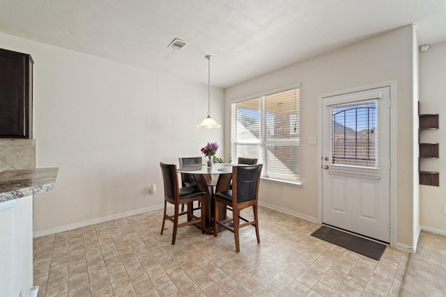 1902 Red Cedar Trl, Rosenberg, TX 77471 - dining area with baseboards and visible vents