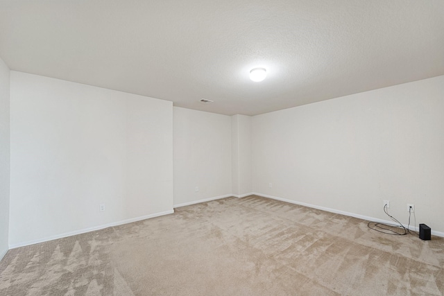 1902 Red Cedar Trl, Rosenberg, TX 77471 - empty room with carpet flooring, a textured ceiling, and baseboards