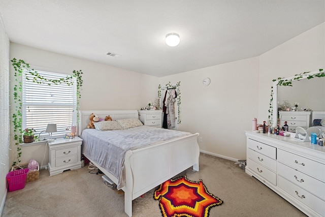 1902 Red Cedar Trl, Rosenberg, TX 77471 - bedroom with visible vents, baseboards, and light carpet